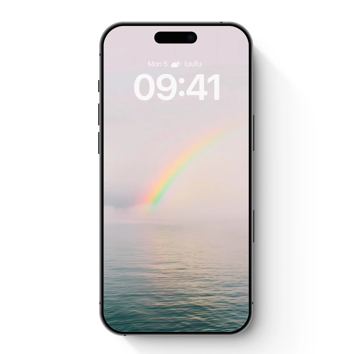 Misty Rainbow Over Calm Waters