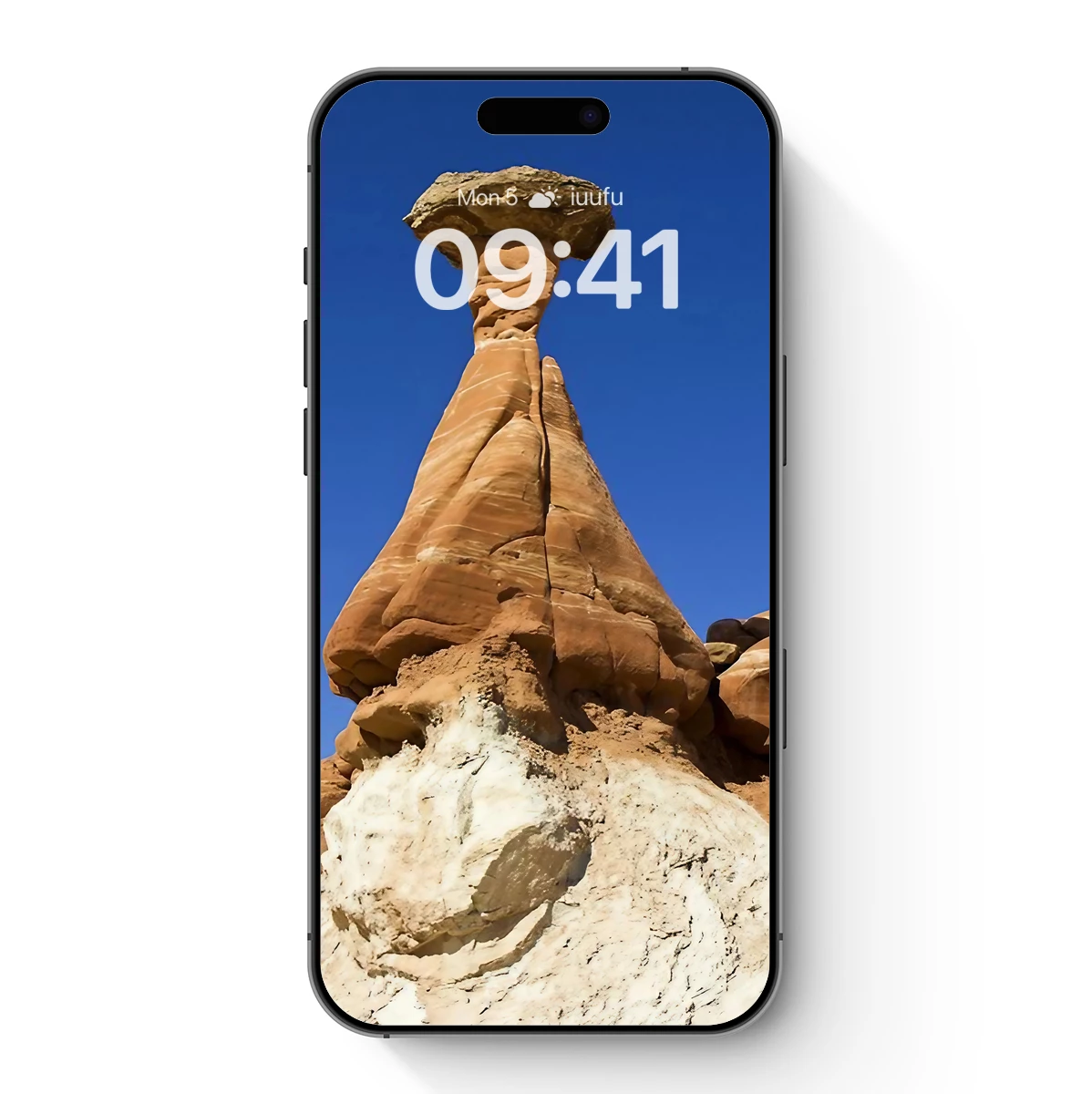 Desert Sentinel: Sandstone Majesty Under Blue Skies